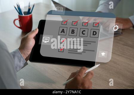 exam online Test with man holding a tablet test or questionnaire show on screen Stock Photo