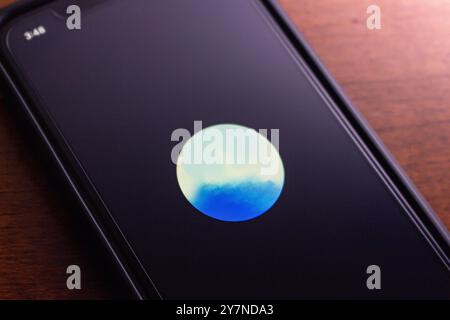 ChatGPT Advanced Voice Mode screen is displayed on an iPhone. Advanced Voice Mode is a feature that enhances voice interaction with ChatGPT Stock Photo