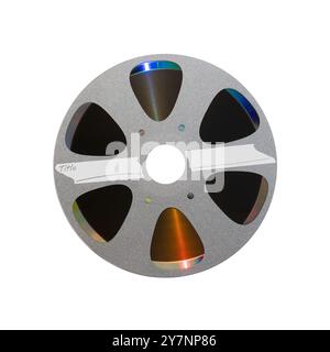 Disc label in the style of cine movie film projector reel bobbin with empty space for the title and rainbow reflection from the surface isolated on wh Stock Photo