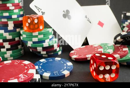 Poker cards and gambling chips on dark background Stock Photo