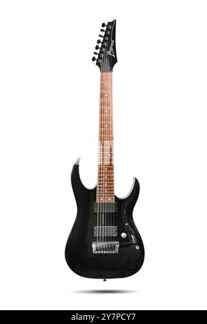 Izmir, Turkey - Jun 20 2024: Front view of an Ibanez electric guitar photographed on a white background, showcasing its sleek black body and wooden fr Stock Photo