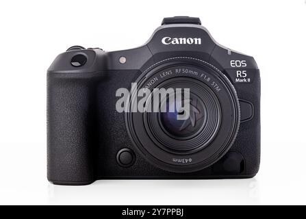 Varna, Bulgaria - August 31,2024: Image of Canon EOS R5 Mark II Mirrorless Digital Camera with Canon RF 50 mm F 1.8  STM  lens on a white background. Stock Photo