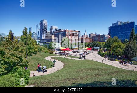 Main Lawn, viewed from Southwest Overlook at Little Island, an artificial island created on concrete pilings at NYC’s Pier 55 on the Hudson River. Stock Photo