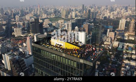 Bangkok, Thailand - January 27, 2024: Aerial view of King Power Mahanakhon skyscraper. The building is currently Thailand's tallest. Stock Photo