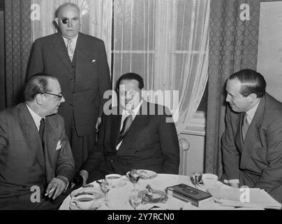 GERMAN DELEGATION TO FOUR-POWER CONFERENCE IN BERLIN 9.2.54. I.N.P. photo shows: Members of the German delegation to the Four-Power conference being held in Berlin. From left to right: Heinrich von Brentano (C.D.U.), Dr. Heinrich Vocke (Berlin representative from Bonn), Dr. Thomas Dehler (F.D.P.), and Herbert Blankenhorn (Chief of the German Delegation). 251/MB/74439. International News Photo. Stock Photo