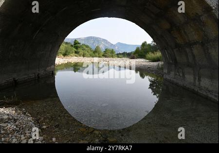 View through the c18th Pont de Trigance or Historic Trigance Bridge on the River Le Jabron with the Verdon Gorge in the Background Var Provence France Stock Photo