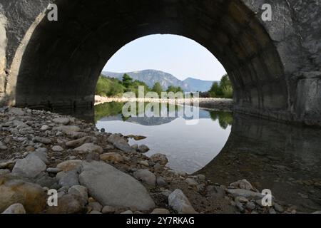 View through the c18th Pont de Trigance or Historic Trigance Bridge on the River Le Jabron with the Verdon Gorge in the Background Var Provence France Stock Photo