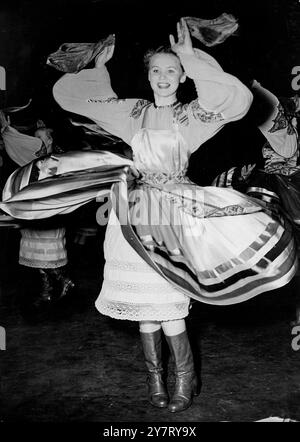 WHIRLING GIRL FROM MOSCOW - 27 April 1954 - Her costume flaring as she spins in a Russian national dance, 19-year-old TAMARA LUKIANOVA of Moscow is pictured on the stage of the Stoll Theatre, London during rehearsal for the opening , tomorrow , of a three-weeks season by the MOSCOM State Dance Company Beryozka . Tamara is one of 47 members of the company who have just come to London after appearing in Holland. Stock Photo