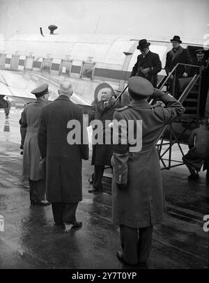 WEST GERMAN CHANCELLOR ARRIVES FOR FUNERAL OF KING. 14.2.52 Dr Konrad Adenauer, the West German Chancellor arrived at Northolt today to attend the funeral of the late King George VI tomorrow. I.N.P. PHOTO SHOWS: Dr Adenauer steps off the plane at Northolt Airport and is greeted by Group Captain Hodson. Picture by R.Haswell. 344/TDH/59722. INTERNATIONAL NSWS PHOTOS. Stock Photo