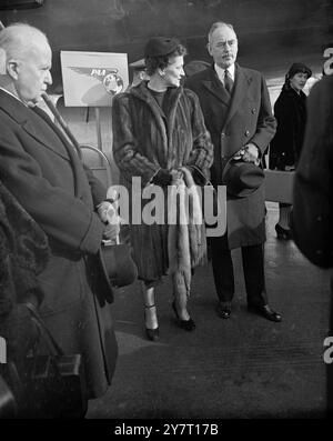 MR. TRUMAN'S REPRESENTATIVE ARRIVES FOR ROYAL FUNERAL 13-2-52 Mr. ACHESON WILL T HEN TAKE PART IN NATO DISCUSSIONS Mr. Dean Acheson, American Secretary of State, arrived at London Airport today tobattend the King's Funeral as President Truman's Representative. He will afterwards take part in discussions of the North Atlantic Treaty Organisation matters in London and Lisbon. I.N.P. PHOTO SHOWS: Mr. Dean Acheson, American Secretary of State, and his wife photographed on arrival at London Airport today from America. Picture by F. Scholes. 164/COM/D/59670 INTERNATIONAL NEWSPHOTOS. Stock Photo