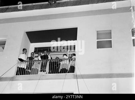 BIRD'S EYE VIEW : POMEZIA, Italy : POPE PAUL VI appeared on the balcony of a Military Chaplains seminary to bless a vast gathering of Roma pilgrims at a nearby encampment . Above him an enthusiastic cameraman got a bird's eye view of the proceedings by perching on the roof of the seminary . The Pope was celebrating his 68th birthday . 26 September 1965 Stock Photo