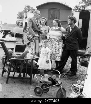 New Cobham Roma Site - Some of residents camped for several months on the confines of the A2 verge are set to be moved to spacious grounds at a new site in Cobham, Kent, England. Plans are ahead to provide a school hut for children before integrating them to the normal school system. Kent , England - 18 August 1962 Stock Photo