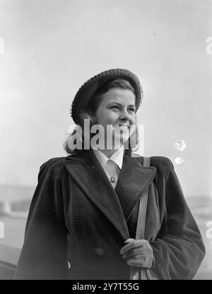 AMERICA'S MAID OF COTTON LOOKS AT LONDON    In London at the start of a 12 - day visit to Britain is 19 - year - old Suzanne Howell , America's  1949 Maid of Cotton .  She will display both home and American cotton fashions at British centres including London , Manchester and Stratford - on - Avon .   Miss Howell , a psychology student at the University of California , beat 17 other contestants for her title .    PICTURE SHOWS :- Miss Suzanne Howell on the Victoria Embankment as she surveyed the London scene .     27 March 1949 Stock Photo