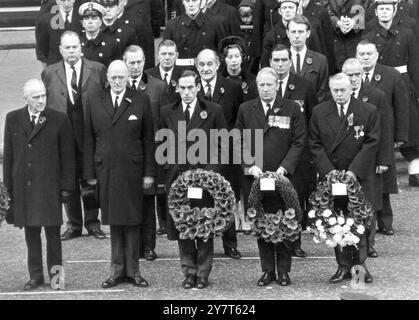 Britian's Prime Minister Harold Wilson (right), Opposition Leader Ted Heath and Liberal Leader Jeremy Thorpe (third from right) holding wreaths which they later placed on the base of the Cenotaph War Memorial in Whitehall this morning, when Her Majesty the Queen led Britain's homage to the dead of two World Wars in Remebrance Day ceremonies. Standing beside Mr Thorpe is Lord Gardiner the Lord Chancellor. Behind the Party leaders are (from left) Mr Michael Stewart, Defence Minister Denis Healey, Education Minister Patrick Gordon Walker, Minister of Housing Anthony Greenwood. In the third row ar Stock Photo