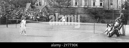 A great lawn tennis duel :  Suzanne Lenglen bv Helen Wills at Cannes that became known as the Match of the Century.   The final of the the ladies ' singles in the Carlton Tournament at Cannes , France on 16 February 1926    An example of Mlle Lenglen's wonderful placing :  Miss Helen Wills (on the near side of the net) does not waste energy in pursuing a ball (seen towards the extreme right of the court ) that is obviously beyond her reach.     Mlle Lenglen won in two straight sets - 6-3, 8-6 . but the second set was a desperate struggle ,   There was a remarkable incident in the twelfth game Stock Photo