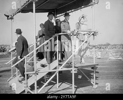 ROYAL FAMILY WATCH GRAND PRIX 13 May 1950  Watched for most of the afternoon by the King, Queen and Princess Margaret, Italy's Alfa Romeo ream roared home in a 1,2,3 victory in the Grand Prix d'Europe, held for the first time in Britain, at the Silverstone track, Northamptonshire today (Saturday).  More than 100,000 people believed to be the largest crowd ever to attend a motor racing event in Britain, saw the Italian ace, Dr. Guiseppe Farina sweep across the line to win the 210 miles event at an average  of 90.95 miles an hour.  Second man home was Luigi Fagioli, averaging 90.92 in his first Stock Photo