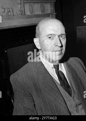 BRITON EXPELLED FROM HUNGARY 12 May 1950  Mr Charles Lamerton, 62 year old British businessman who was expelled from Hungary, pictured in his office in Stratford Place, Mayfair, London today (Friday).  He arrived in London with his wife, Margaret aged 62 last night. Seized by the Hungarian Security Police in Budapest, Mr Lamerton was held captive for 25 days. 'I was kept in a cell four by two and a half yards', he said. 'Periodically I was called for questioning.  No threats were made.'  When he was released, Mr Lamerton was ordered to leave Hungary.  No official reason has been given for the Stock Photo