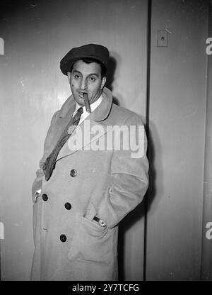 NEW FACE FROM AMERICA    DANNY THOMAS , one of America's top-ranking cabaret comedians arrived at Southampton aboard the United States liner ' America ' to be at the London Palladium when it reverts to variety next Monday, March 27.  Thomas, who is been considered worthy to rank with Danny Kaye, Al Jolson and Maurice Chevallier as an entertainer, was born in Toledo, USA, one of the 10 children of a Syrian candy maker- his real name is Amos Jahoob .  38 years of age Thomas is 5 foot 11 inches.tall, and has been described as having black hair, a pair of sad black eyes and a long nose   who has b Stock Photo