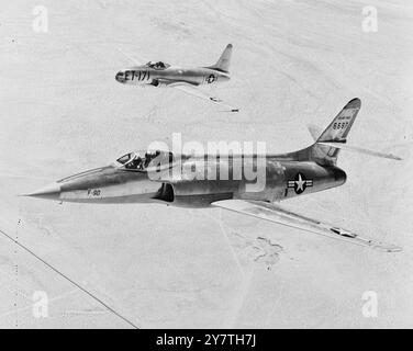 U.S. JET WITH PIN-POINT NOSE Undergoing tests near its base in Burbank, California, is this twin-jet, sharp-nosed, American fighter aircraft, the Lockheed XF-90, shown here in flight accompanied by another U.S.jet fighter (in background). The XF-90 has been designed to operate as a' penetration' fighter deep in enemy territory against enemy aircraft and ground targets. The XF-90 has conventional landing gear, a pilot-ejection seat, cabin pressure control, and air conditioning.  24 October 1949 Stock Photo