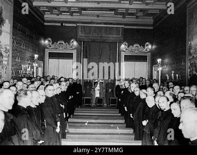 Pope receives Jesuit delegates - The Rev Giovanni Battista Janssen , the new General of the Society of Jesus and the 167 delegates to the General Chapter who had elected Father Janssen in Rome , were received by the Pope at his summer residence , Castel Gandolfo - Photo shows: The scene at the audience , with the delegates assembled each side of the Pope's throne . - September 1946 Stock Photo