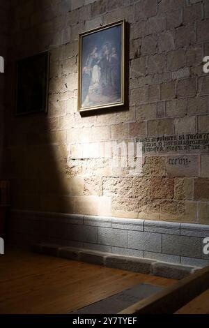 Avila, Castilla y Leon, Spain- August 18, 2024: Paintings on the wall in Basilica of San Vicente Church, also known as church of the martyrs brothers Stock Photo