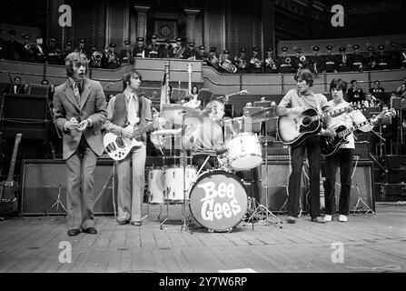 The Bee Gees pop group seen rehearsing with their 60 piece backing orchestra before their concert at the Albert Hall tonight, London, England. The concert sets off their tour of 27 cities in Britain and Eire. Then in August they start a tour of 25 cities in the USA including a performance at the Hollywood Bowl.27 March 1968 Stock Photo