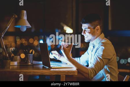 Smiling Businessman Using Voice Assistant In Modern Office At Night Stock Photo