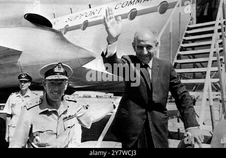 Aden :  British High Commissioner Sir Humphrey Trevelyan waves farewell to Aden as he ends his term of office with the withdrawal of British Troops .  Travelling with him is the Commander-in-Chief of British Forces in the Middle East , Admiral Sir Michael Le Fanu 28 November 1967 Stock Photo