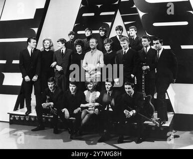 All the Merseysound stars - the British TV entry for the Golden Rose of Montreux contest in Switzerland .  Left to right top ; Beatles Ringo Starr , John Lennon , George Harrison , Paul McCartney and singer Chris Curtis ( middle row ) Billy J Kramer , Jean Ryder , Tommy Quickly , Margo Quantrill , Brian Matthews , Vicki Haseman . Johnny McNally , Mike Maxfield  , Cilla Black , Tony Jackson , Robin McDonald . 13th  February 1964 Stock Photo