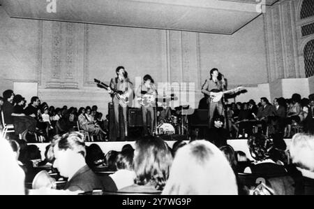 The Beatles on stage at Carnegie Hall , New York , USA 13th February 1964 Stock Photo