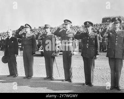 Sennelager , Germany 'Agility Two' review and march past in Germany .  Left to Right - Mr Emanuel Shinwell , British Minister for War ; Lt General Sir Charles Keightley , General De Lattre De Tassigny ( France ) General Sir Brian Robertson , British High Commissioner for Germany and Air Chief Marshal Sir James Robb and General Handy , The United States Commander of Eucom Forces , taking the salute at the reviews   9 October 1949 Stock Photo