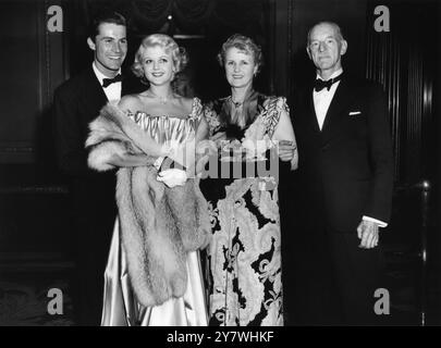 Peter Shaw , Angela Lansbury , Moyna MacGill (Angela's mother ) and Mr W Pullen (Peter Shaw's father ) photographed at the premiere of Conspirator at the Empire Theatre , Leciester Square , London 28th July 1949 Stock Photo