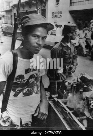 Rebel Soldier in Santo Domingo Dominican Republic wearing a Beatles T-Shirt. 21st May 1965 Stock Photo