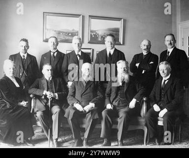 First Labour Cabinet in Denmark . Standing L to R :- M . Bording ( Minister of Agriculture ) , Rev . Dahl ( Ecclesiastical Affairs ) , M . Rasmussen ( Minister of Defence ) , M . Friis - Skootte ( Public Works ) , M . Hauge ( Minister of the Interior ) , M . Steinoke ( Minister of Justice ) .  Sitting (Left to Right ) :- Mrs Nina Bang ( Minister Of Public Instruction ) < Count Moltke ( Foreign Office ) , M Stauning ( Pdremier and President of the Board of Industries Trade and Shipping ) , M . Broghjerg ( Minister of Social Affairs ) , M Bramsnaes ( Minister of Finance ) .  29 April 1924 Stock Photo