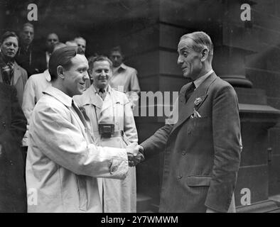 Scotland Yard Secrets ' For Export ' Danish police visit  Party of Danish Police led by Ernst Larsen , Deputy Chief Constable of Copenhagen , is greeted on the steps of New Scotland Yard by Assistant Secretary C . R . D . Pulling .  15 October 1946 Stock Photo