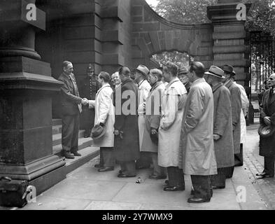 Scotland Yard Secrets ' For Export ' Danish police visit . A party of Danish Police led by Ernst Larsen , Deputy Chief Constable of Copenhagen , is greeted on the steps of New Scotland Yard by Assistant Secretary C . R . D . Pulling .  15 October 1946 Stock Photo