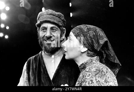 Top Israeli actor Topol and comedienne Miriam Karlin , both in Russian costume , pictured on the stage of Her Majesty's Theatre in London . Both star in a London production of the successful musical Fiddler on the Roof . Topol stars as Tevye , the Milkman , and Miriam , portrays Golde , his wife . The musical is set in Tzarist Russia . 14 February 1967 Stock Photo