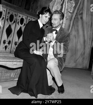 Sir John Gielgud , in his guise as Ivanov , clasps the hand of Claire Bloom , who plays his second wife , Sasha in a scene from the Russian classic which opens at the Phoenix Theatre , London , 30 September 29 September 1965 Stock Photo