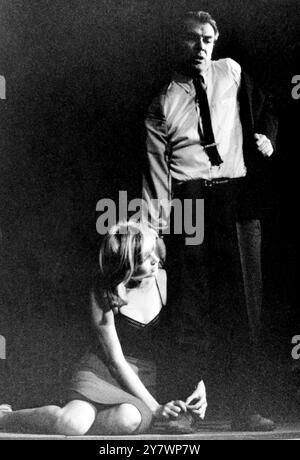 Italian actress and actor , Monica Vitti and Goirgio Albertazzi are shown in a scene from American dramatist Arthur Miller's new play , After the Fall . The play is believed by many to be based on the life of the late Marilyn Monroe , who was once married to Miller . 29 December 1964 Stock Photo
