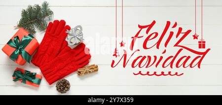 Greeting card with gifts, gloves and text FELIZ NAVIDAD (Spanish for Merry Christmas) Stock Photo