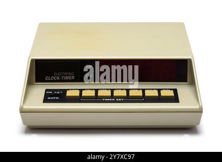 Old Electronic Clock Timer Front Cut Out on White. Stock Photo