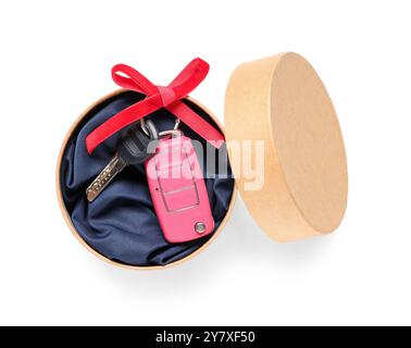 Gift box with keys of new car on white background Stock Photo