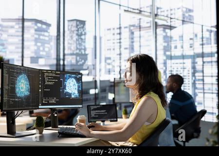 Developer conducting experiments and tests to optimize artificial intelligence machine learning models for performance and accuracy. IT specialist in office analyzing and interpreting complex AI data Stock Photo