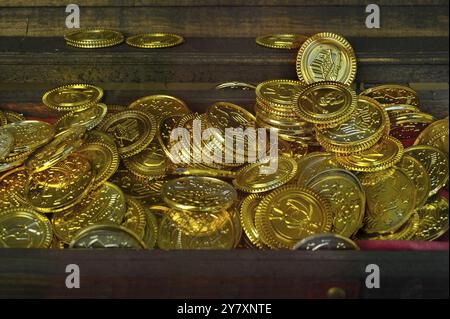 Shop window with decoration, treasure chest with gold coins, Germany, Europe Stock Photo