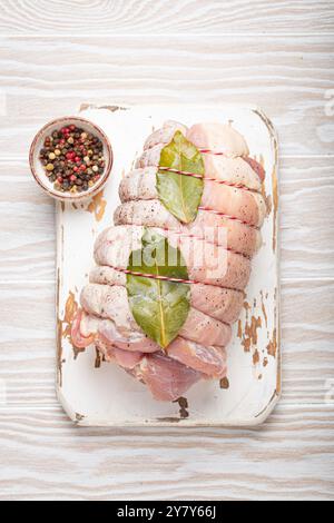 Raw porchetta (rolled pork roast) Stock Photo