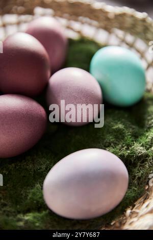 Colourful Easter eggs in a basket Stock Photo