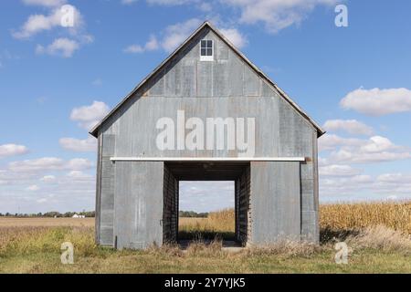 A vintage wooden corn crib with a blue autumn sky on a farm in Danville, Iowa. Stock Photo