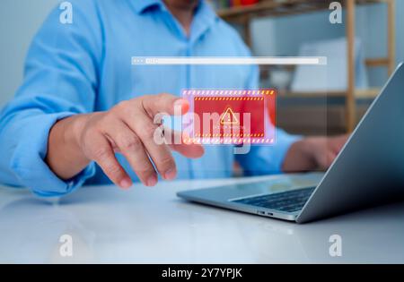 System warning hacked alert, Staff receive notifications from the system fraud alert, Laptop shows a warning sign of system failure, Notification spam Stock Photo