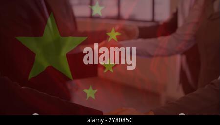 Image of diverse male and female business people shaking hands over flag of china Stock Photo