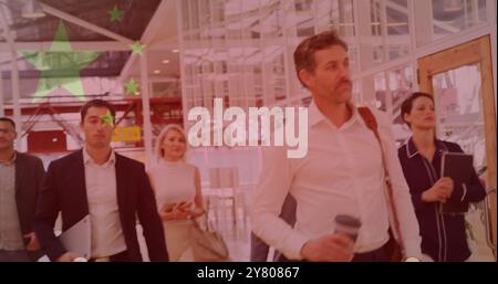 Image of diverse business colleagues walking through foyer over flag of china Stock Photo